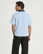 Man wearing the Romimi Adam Braided Collar Polo - Sky Blue, back view