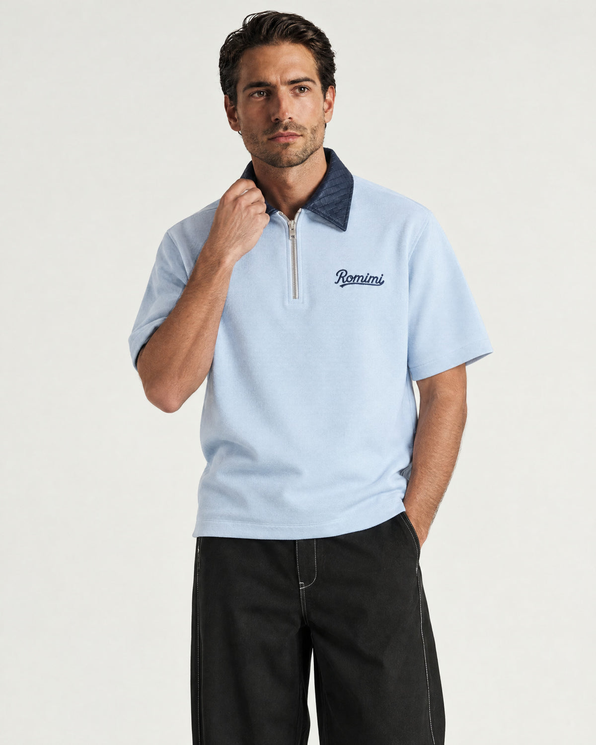 Man wearing the Romimi Adam Braided Collar Polo - Sky Blue, front view