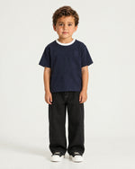 Little boy wearing the Romimi Alex Contrast Collar Tee, front view