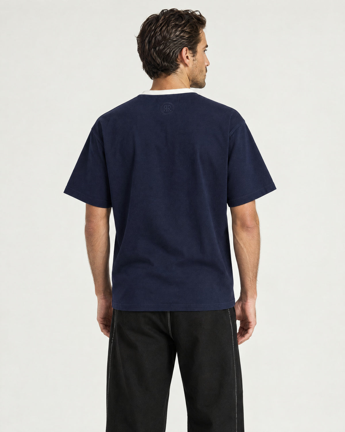 Man wearing the Romimi Alex Contrast Collar Tee, back view