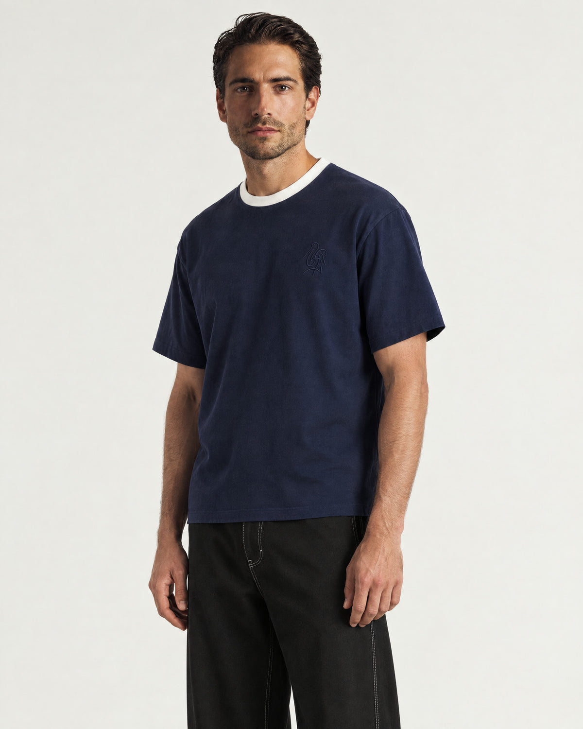 Man wearing the Romimi Alex Contrast Collar Tee, front view