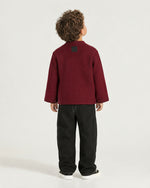Little boy wearing the Romimi Atelier Kimono Overshirt, back view