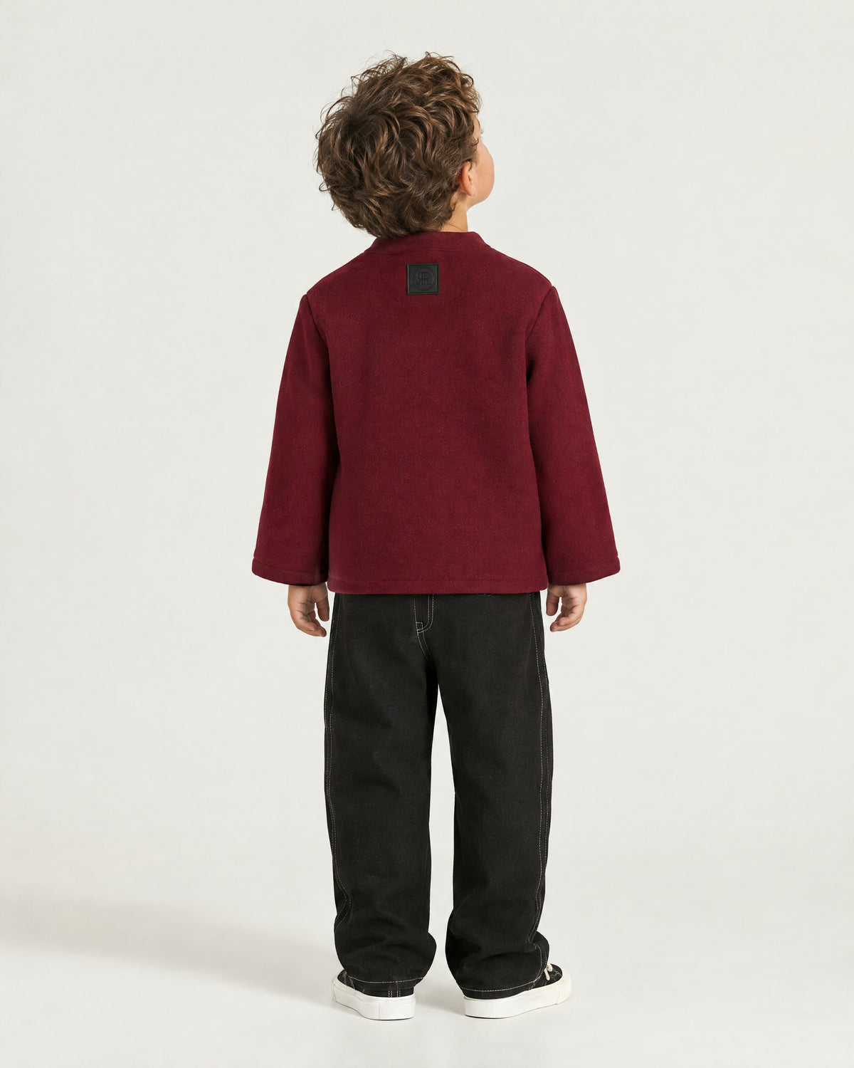 Little boy wearing the Romimi Atelier Kimono Overshirt, back view