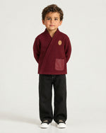 Little boy wearing the Romimi Atelier Kimono Overshirt, front view