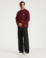 Man wearing the Romimi Atelier Kimono Overshirt, full length