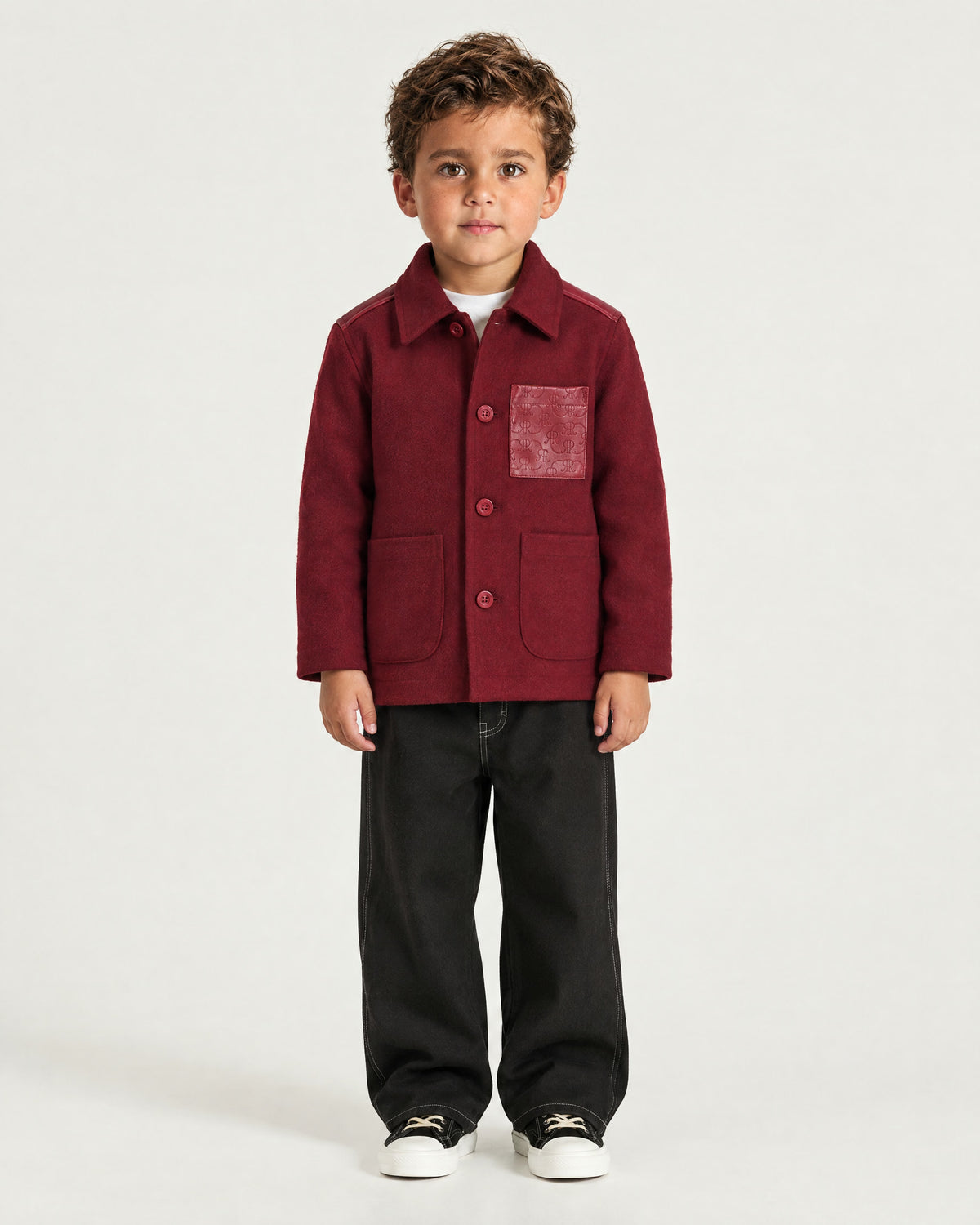 Little boy wearing the Romimi Atelier Wool Overshirt, front view