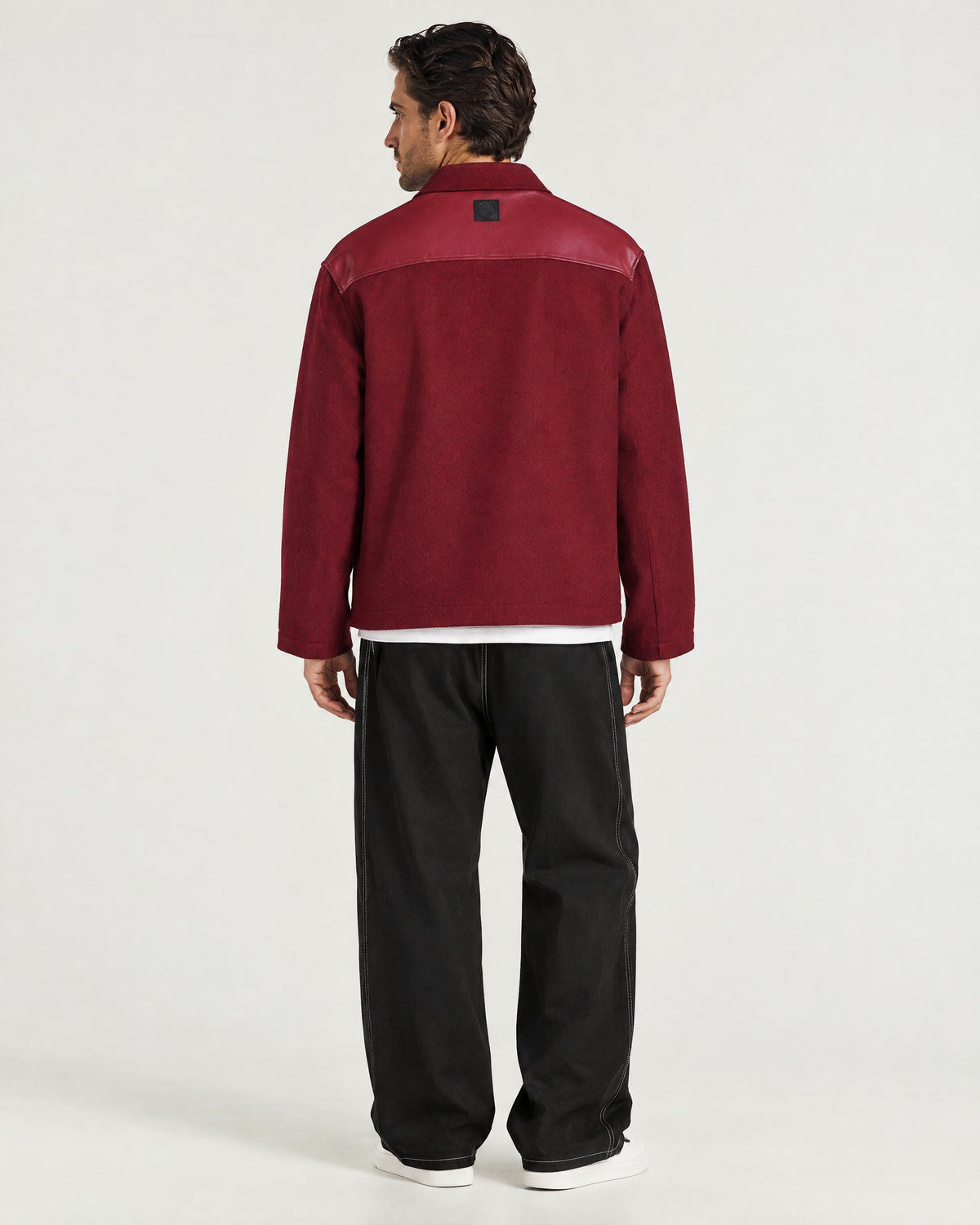 Man wearing the Romimi Atelier Overshirt, back view