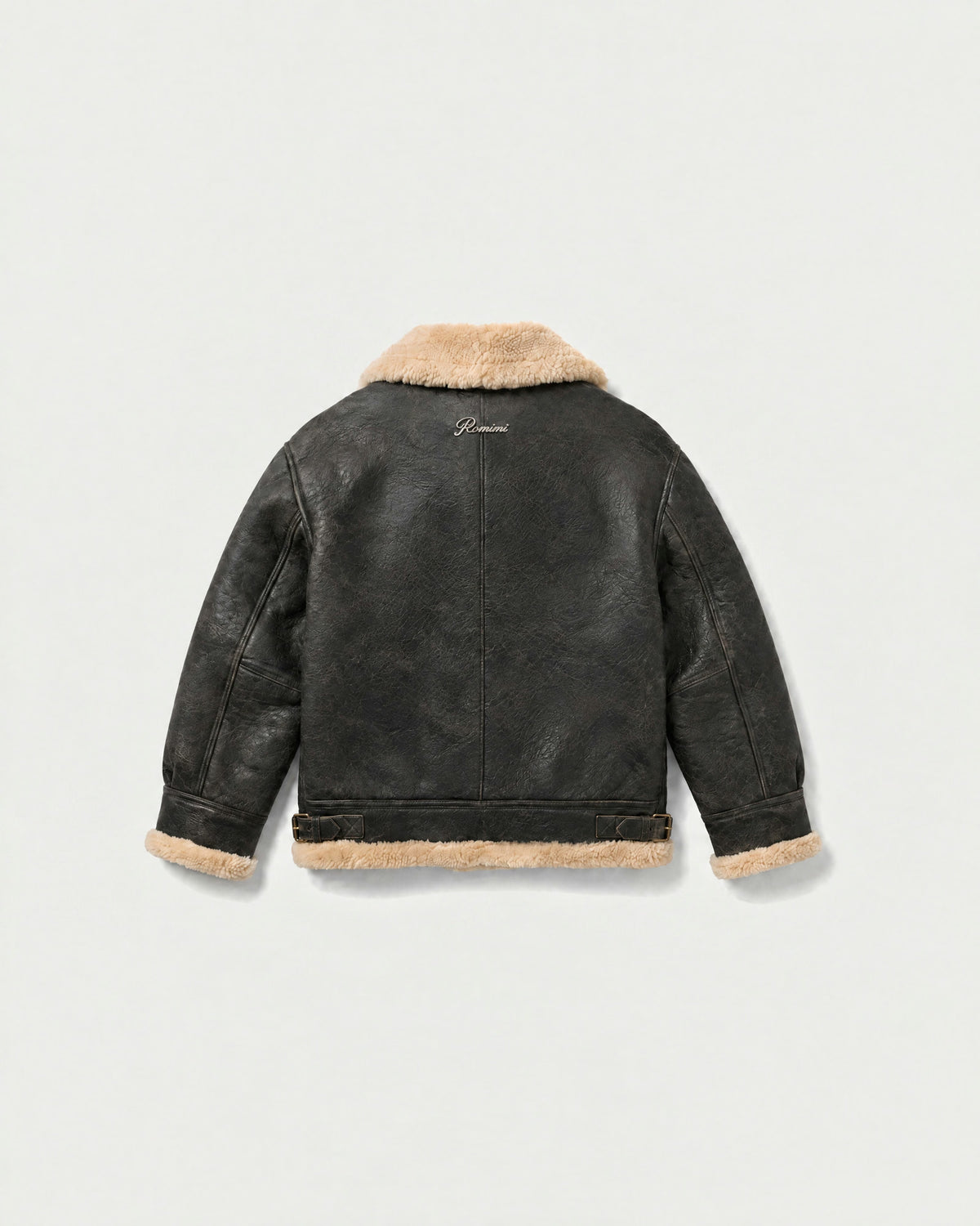 Romimi kids aviator jacket in black with a cream collar, back view