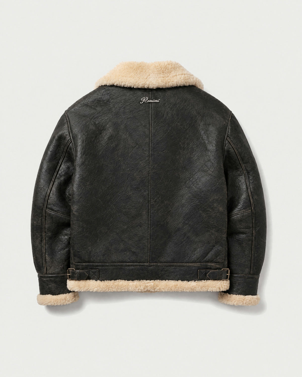 Romimi aviator jacket in black with a cream collar, back view