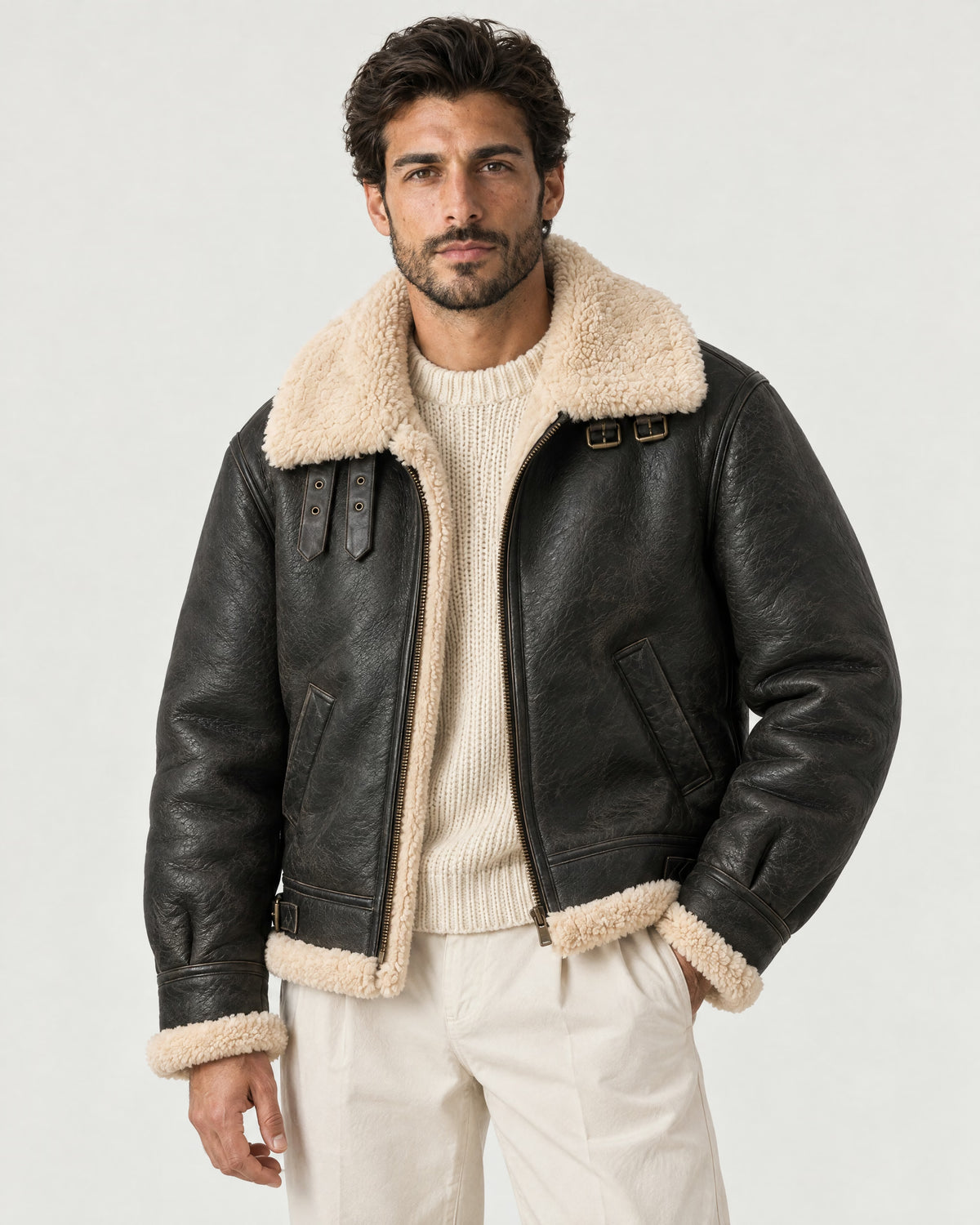 Man wearing the Romimi aviator jacket in black with a cream collar, front view