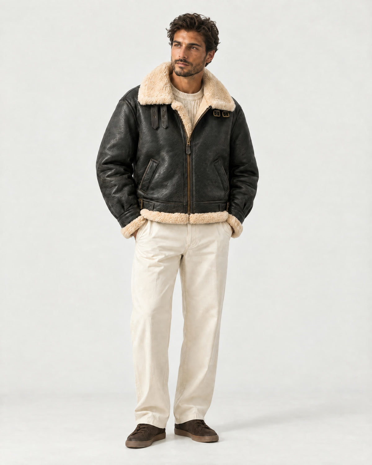 Man wearing the Romimi aviator jacket in black with a cream collar, full length
