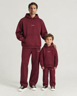 Father and son wearing the Romimi Bond Signature Hoodie