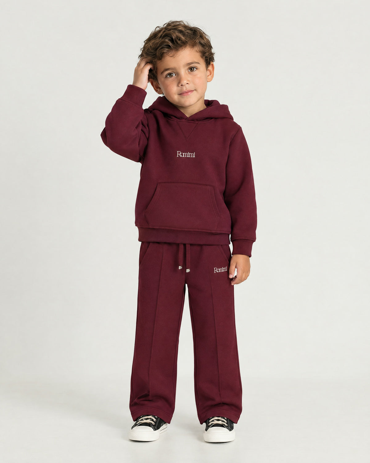 Little boy wearing the Romimi Bond Signature Jogger, front view