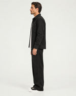 Romimi Brushed Overshirt in Black, side view, worn