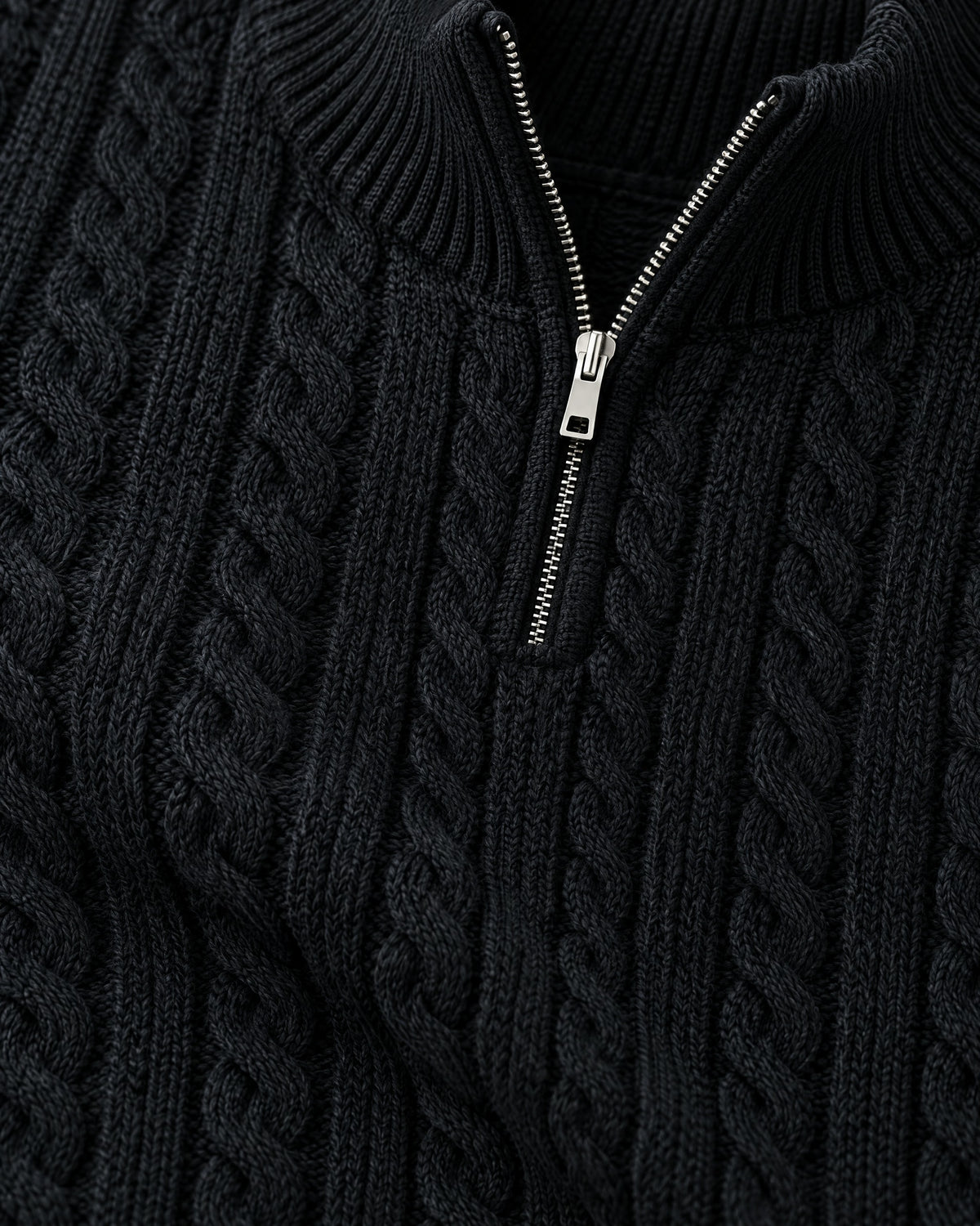 Romimi Cable Knit Quarter-Zip in Black, fabric close-up