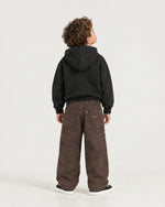 Little boy wearing the Romimi Carpenter Pant - Chocolat, back view