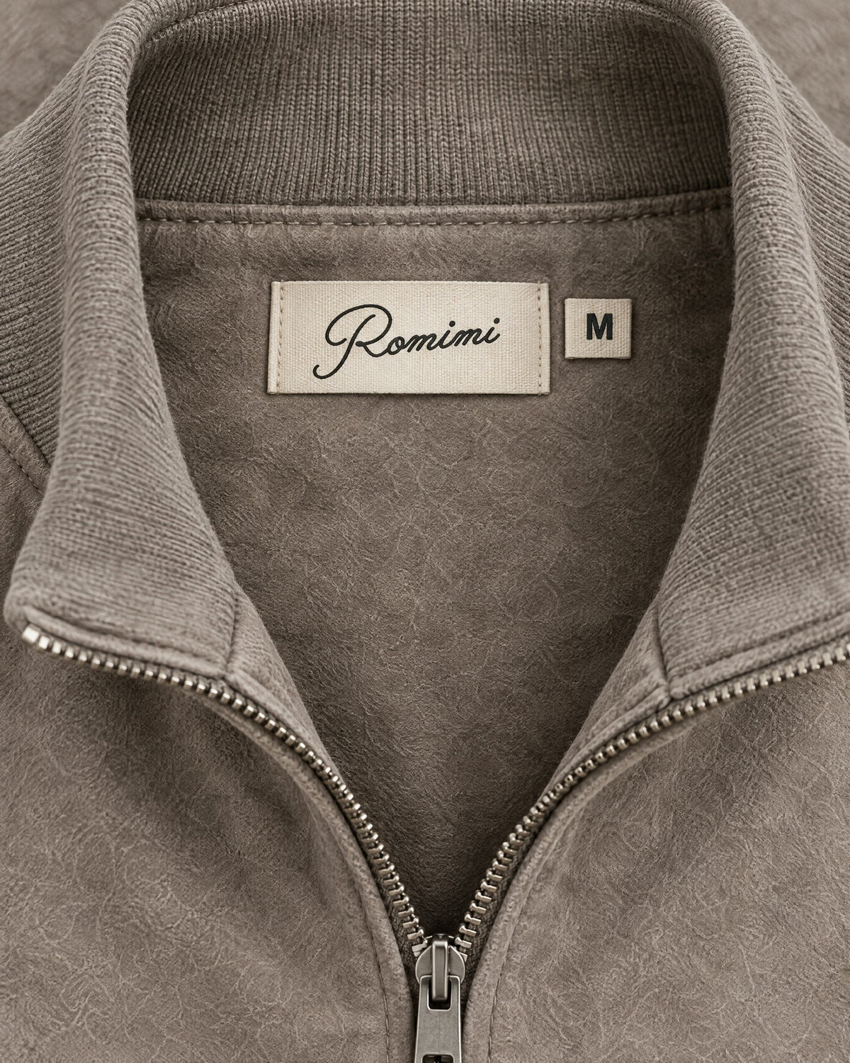 Romimi Faux Suede Bomber in Grey, label close-up