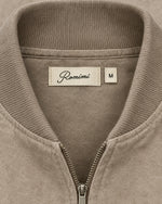 Romimi Faux Suede Bomber in Taupe, label close-up