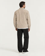 Romimi Faux Suede Overshirt in Beige, back view, worn
