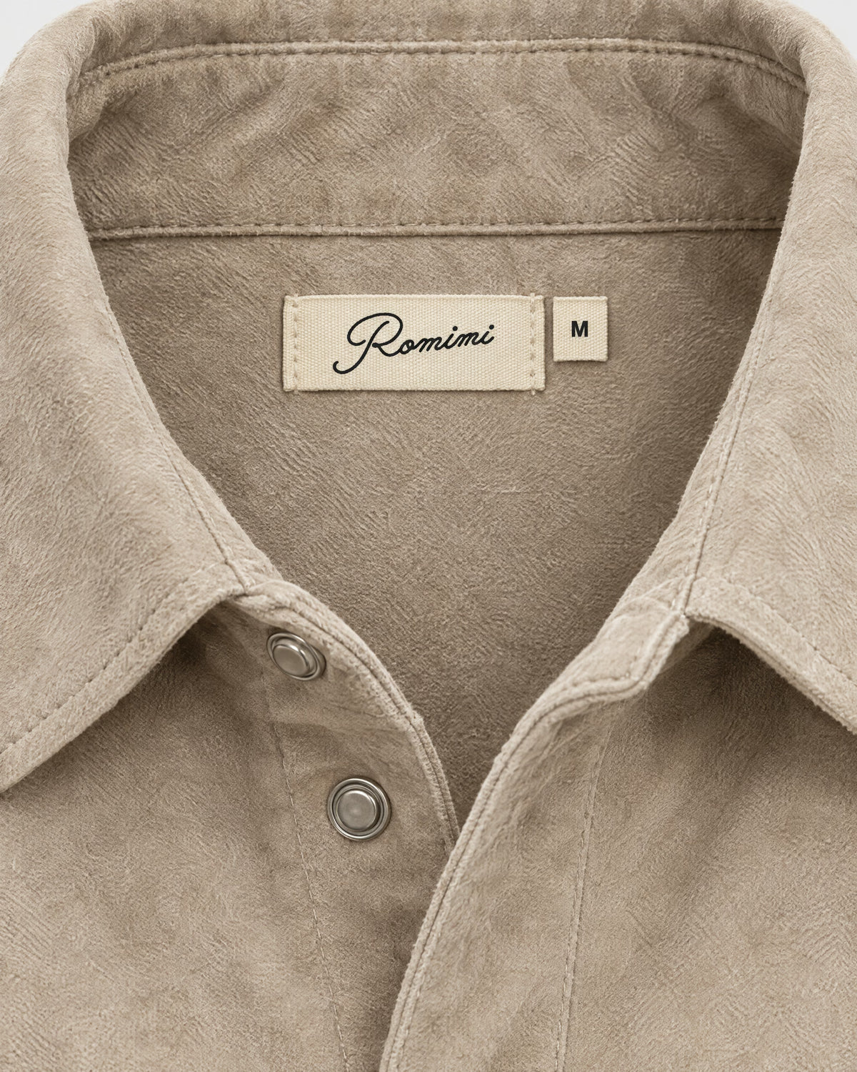 Romimi Faux Suede Overshirt in Beige, label close-up