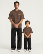 Father and son wearing the Romimi Graphic Tee - Chocolat