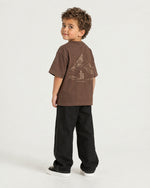 Little boy wearing the Romimi Graphic Tee - Chocolat, back view