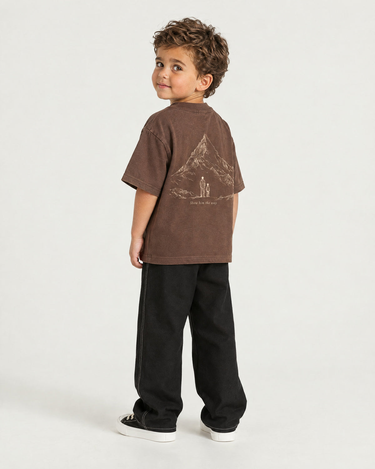 Little boy wearing the Romimi Graphic Tee - Chocolat, back view