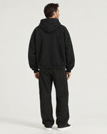 Romimi Heavyweight Hoodie in Black, back view, worn