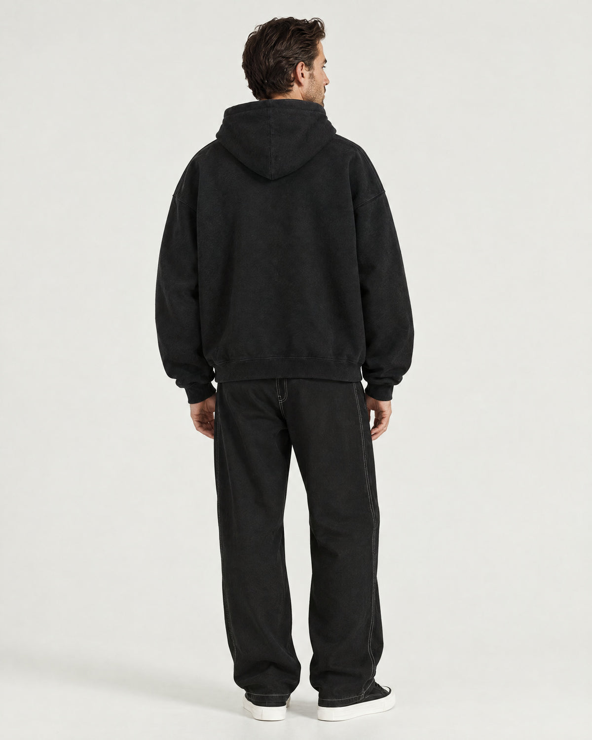 Romimi Heavyweight Hoodie in Black, back view, worn