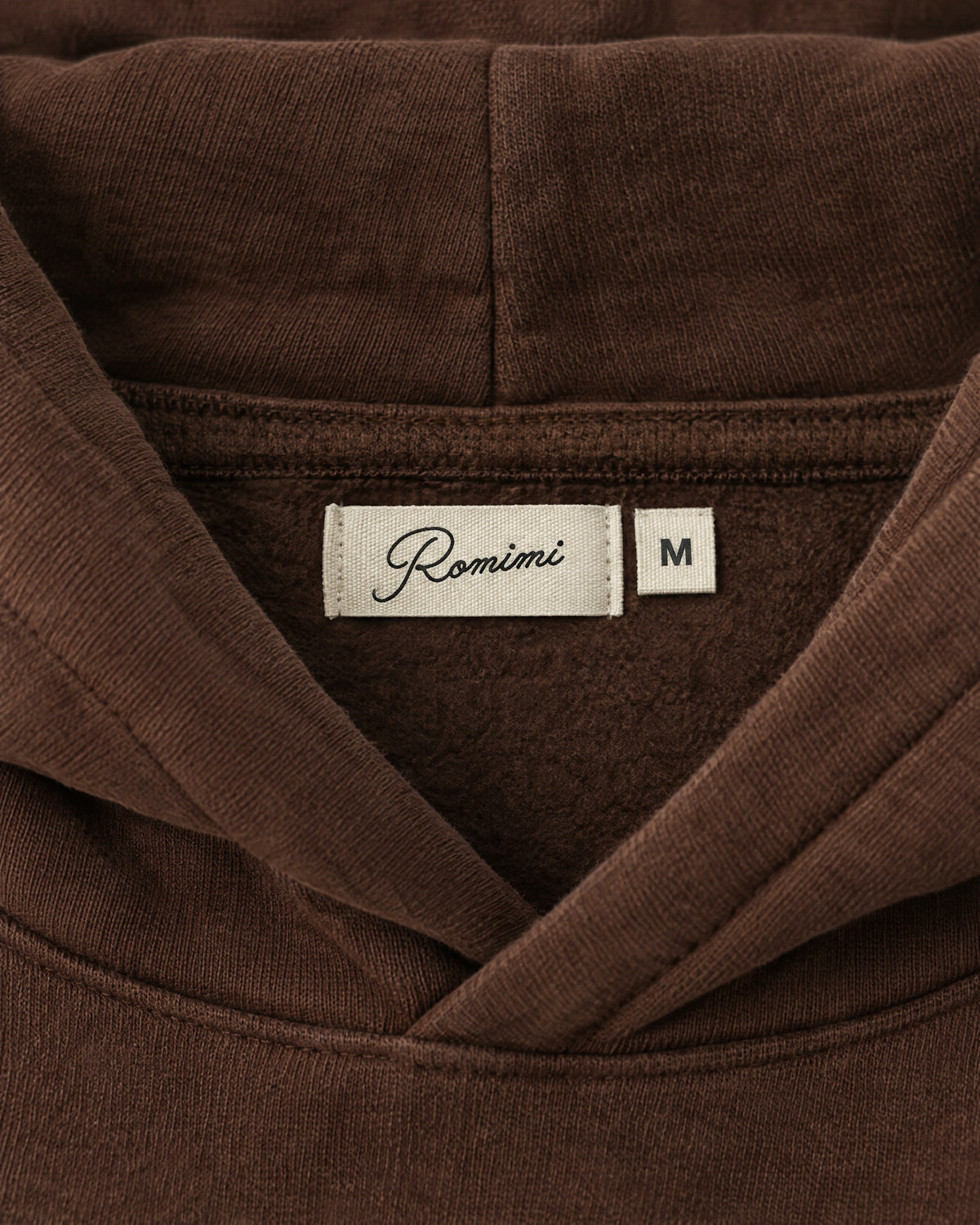 Romimi Heavyweight Hoodie in Chocolate, label close-up