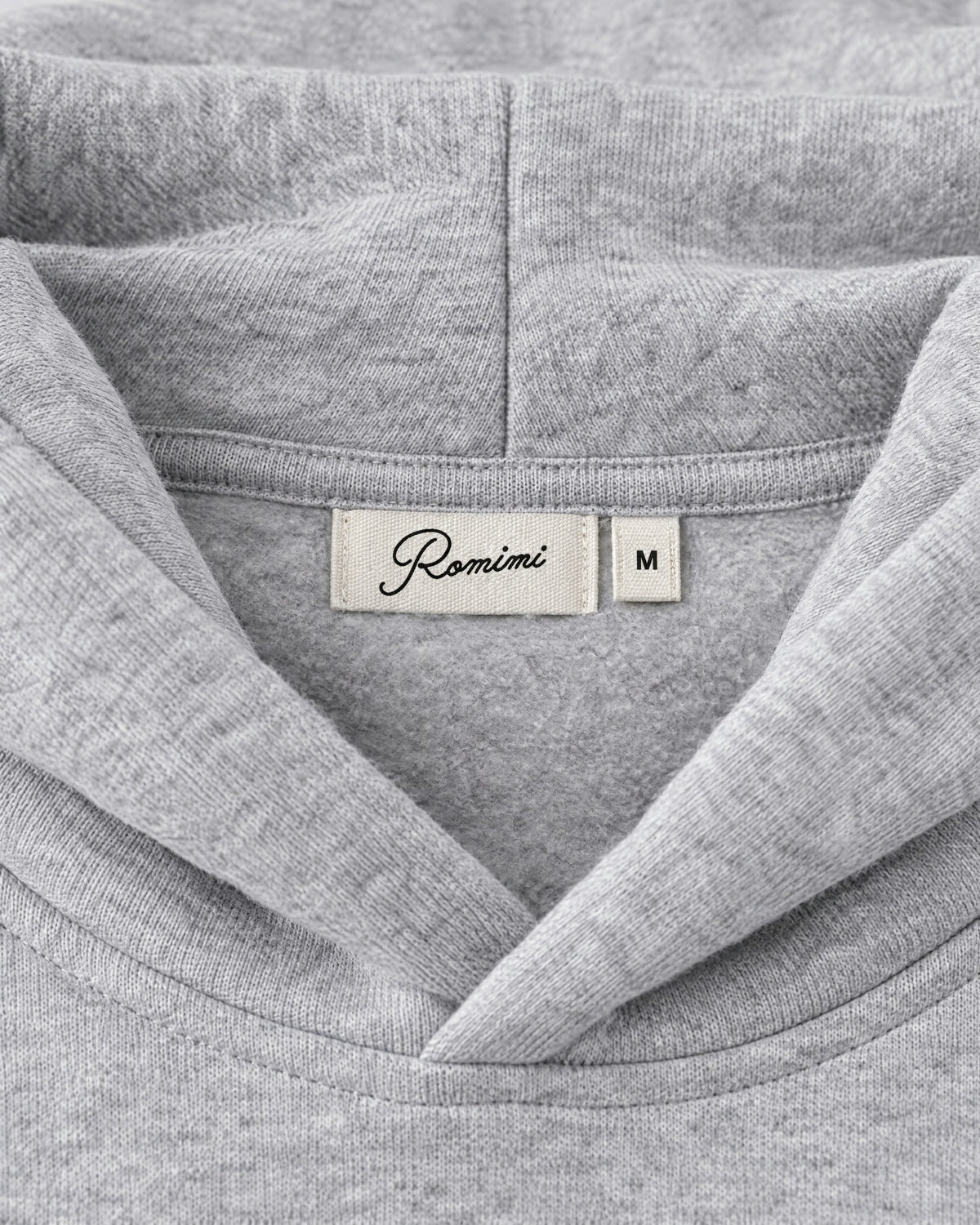 Romimi Heavyweight Hoodie in Grey Melange, label close-up