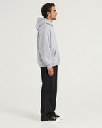 Romimi Heavyweight Hoodie in Grey Melange, side view, worn