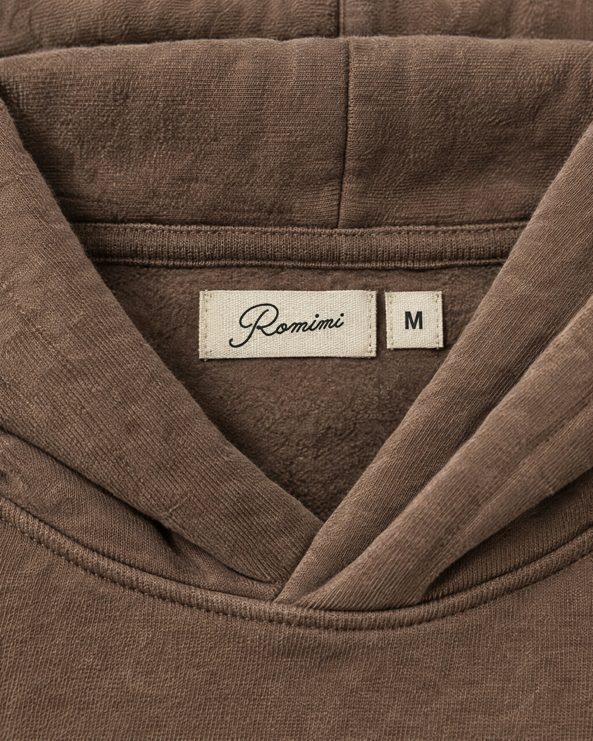Romimi Heavyweight Hoodie in Mocha, label close-up