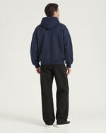 Romimi Heavyweight Hoodie in Navy, back view, worn