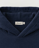 Romimi Heavyweight Hoodie in Navy, label close-up