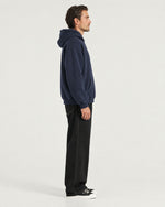 Romimi Heavyweight Hoodie in Navy, side view, worn