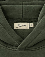 Romimi Heavyweight Hoodie in Olive, label close-up
