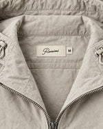 Romimi Hooded Tech Jacket in Beige, label close-up