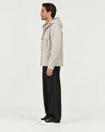 Romimi Hooded Tech Jacket in Beige, side view, worn