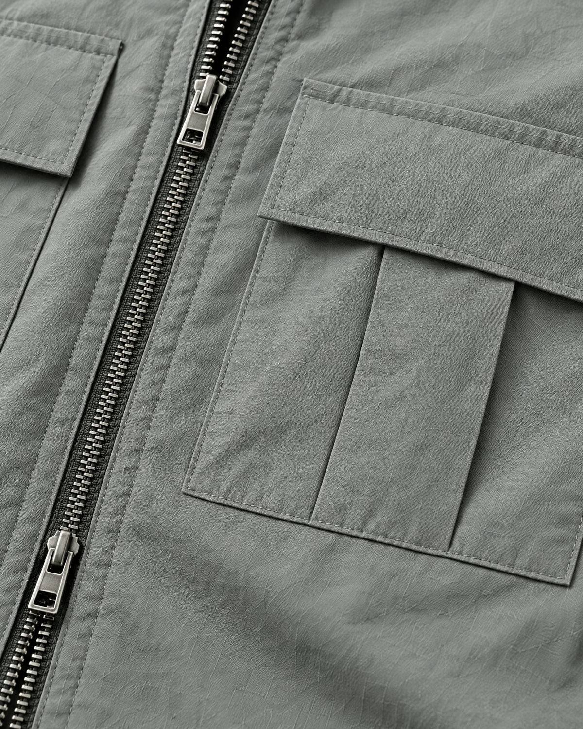 Romimi Hooded Tech Jacket in Sage Grey, fabric close-up