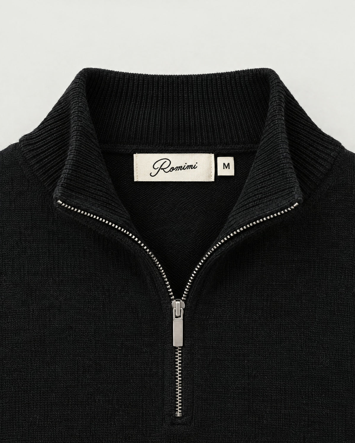 Romimi Knit Half-Zip in Black, label close-up
