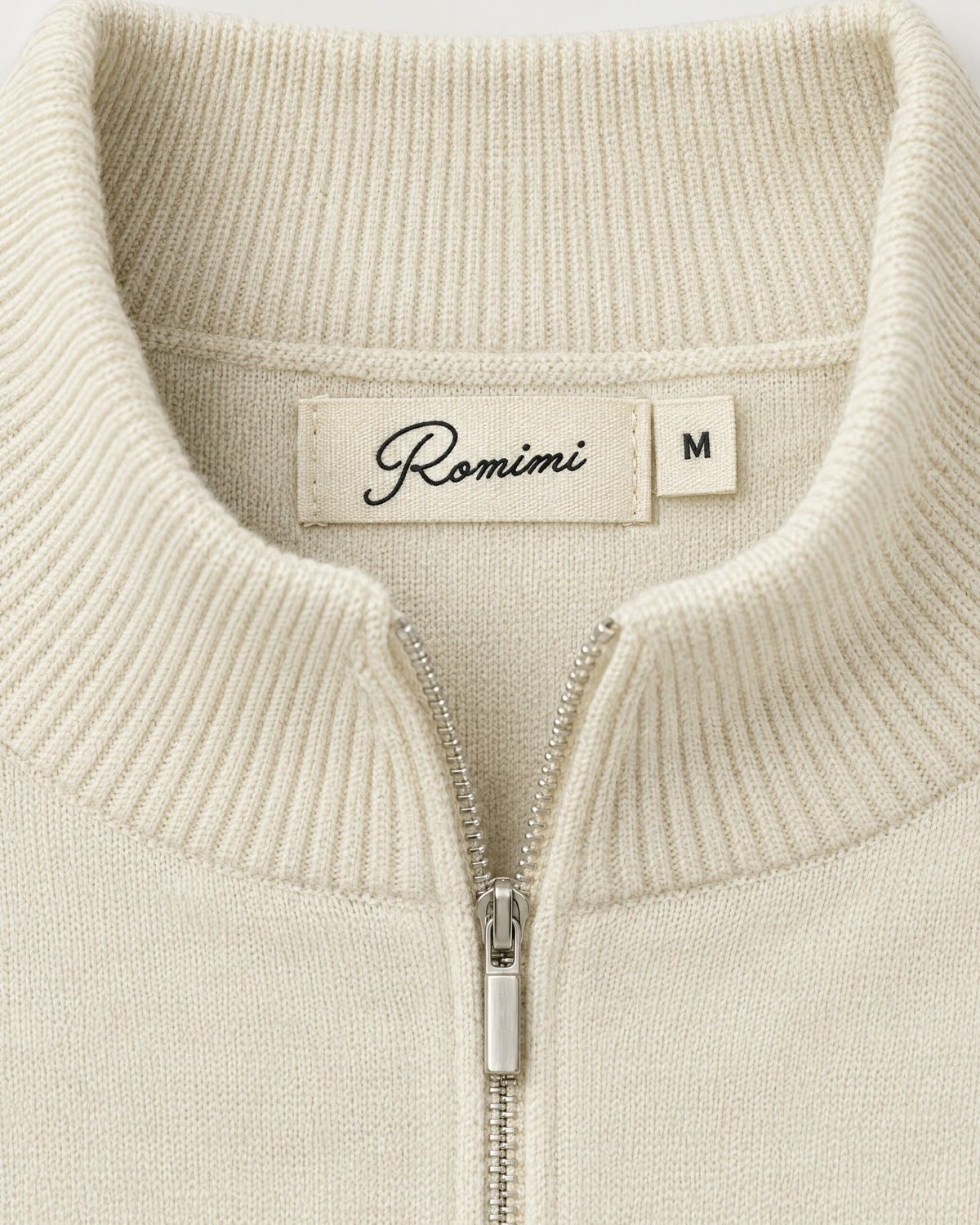 Romimi Knit Half-Zip in Cream, label close-up