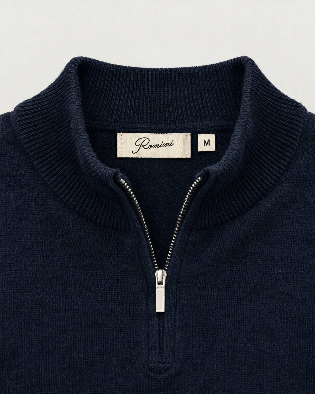 Romimi Knit Half-Zip in Navy, label close-up