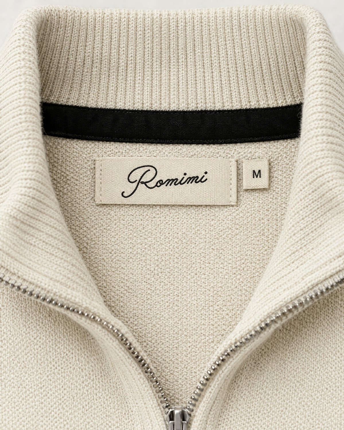 Romimi Knit Zip Cardigan in Cream, label close-up