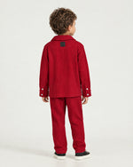 Little boy wearing the Romimi Pleat Shirt, back view