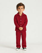 Little boy wearing the Romimi Pleat Shirt, full length