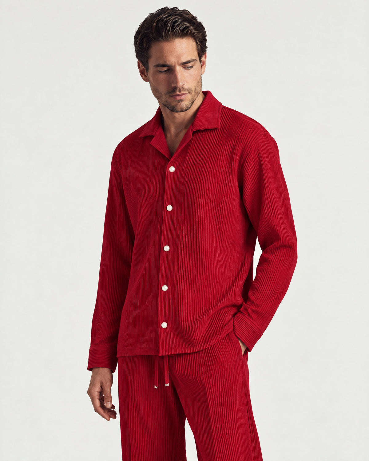 Man wearing the Romimi Pleat Shirt, three-quarter view