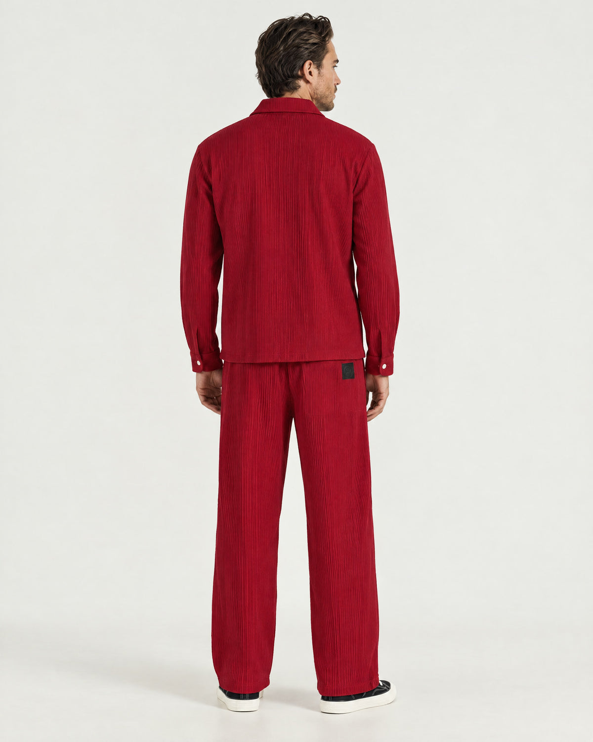 Man wearing the Romimi Pleat Pant, back view
