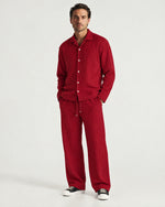 Man wearing the Romimi Pleat Pant, front view