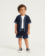 Little boy wearing the Romimi Léon Cotton Shirt, full length